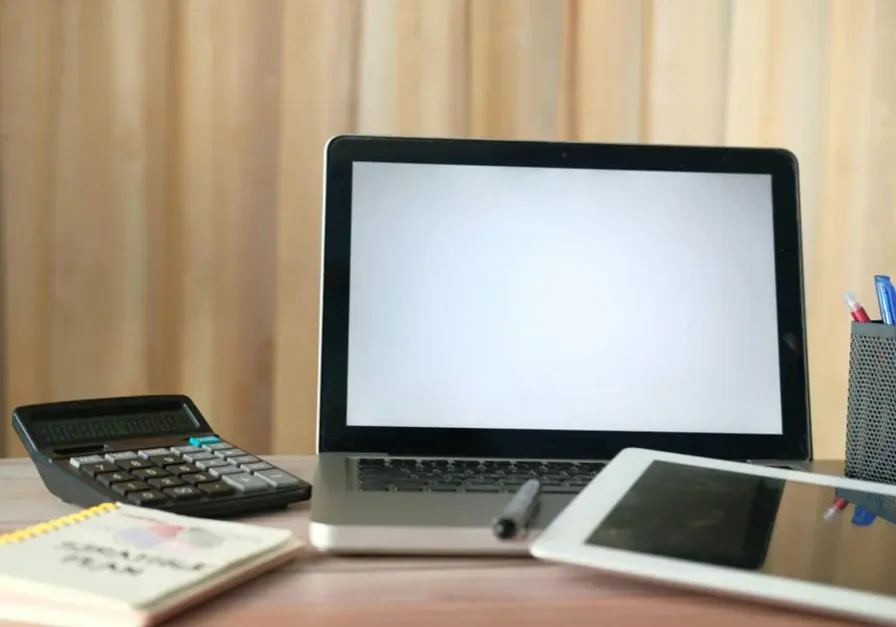 Small business workspace with accounting software